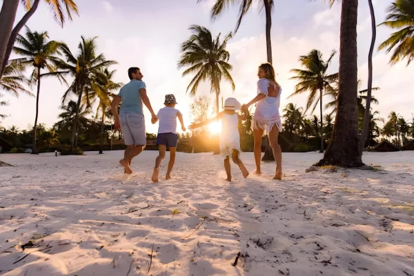 family having fun in the beautifuly beaches of Zanzibar