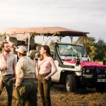 couple at Serengeti National Park enjoying their honeymoon with the local guide