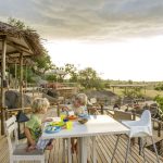 Children enjoying a game drive at Nomad Serengeti Safari Camp, Tanzania