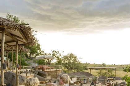 Children enjoying a game drive at Nomad Serengeti Safari Camp, Tanzania