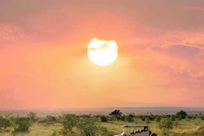 Transformative safari Tanzania 11 days — guests at a Serengeti sundowner on an East Africa Safari Guides extended stay departure