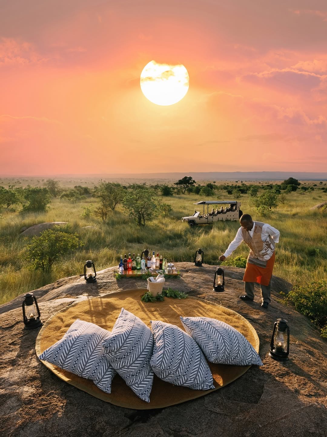 Transformative safari Tanzania 11 days — guests at a Serengeti sundowner on an East Africa Safari Guides extended stay departure