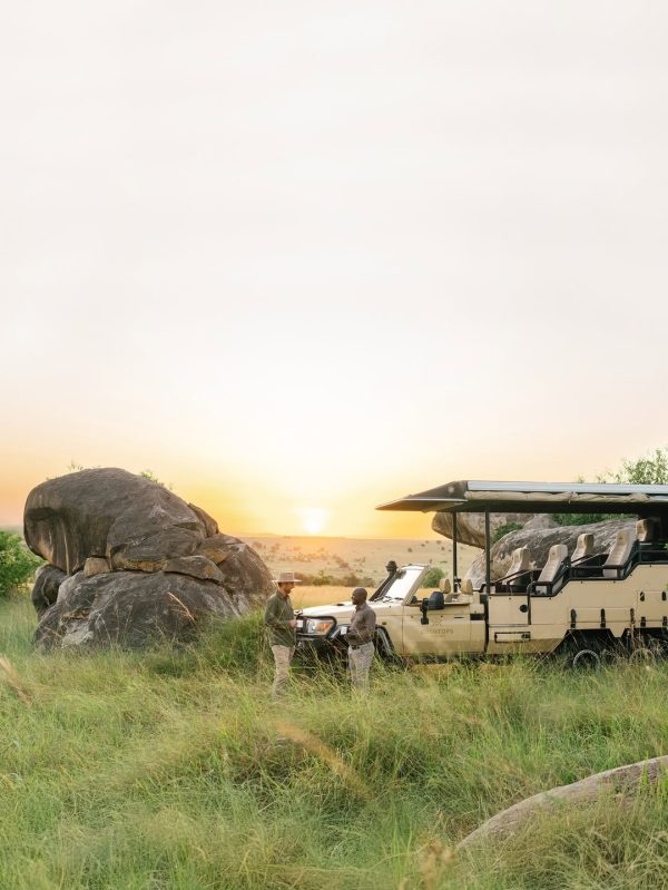 Clients relaxing in the evening after game drive, getting a magic sundowner on a Wildlife Safari tours on Northern Tanzania Safari Circuit with East Africa Safari Guides