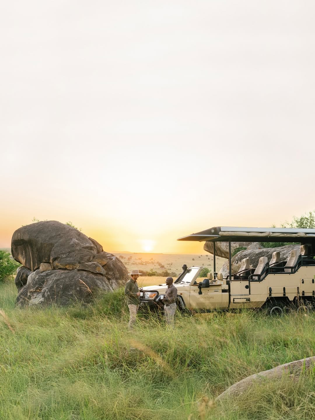 Clients relaxing in the evening after game drive, getting a magic sundowner on a Wildlife Safari tours on Northern Tanzania Safari Circuit with East Africa Safari Guides